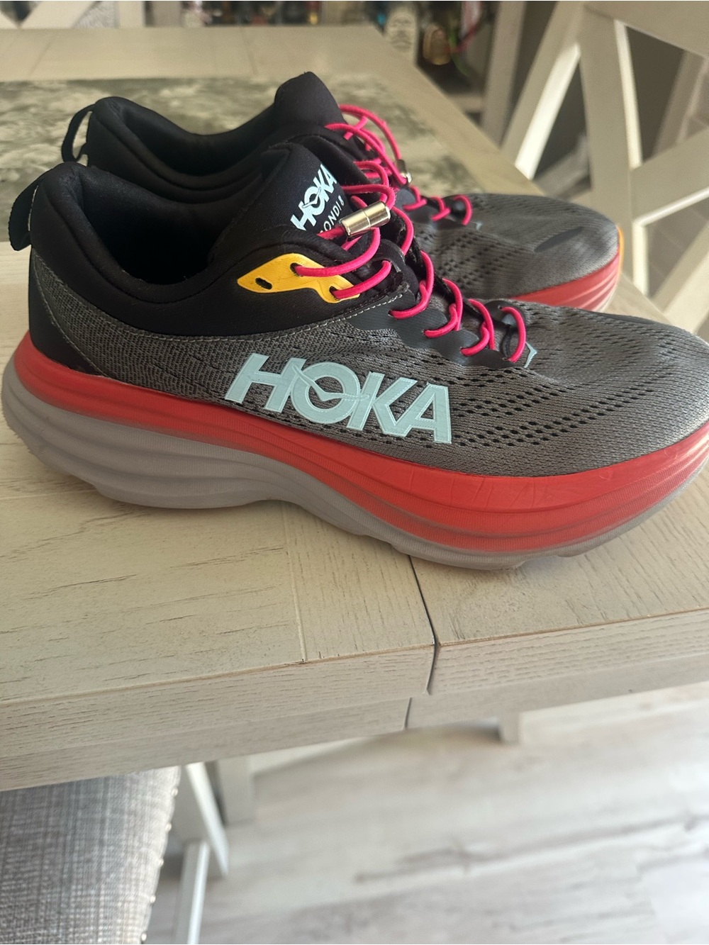 Hoka Gray Running Sneakers with Coral Midsole and Pink Laces